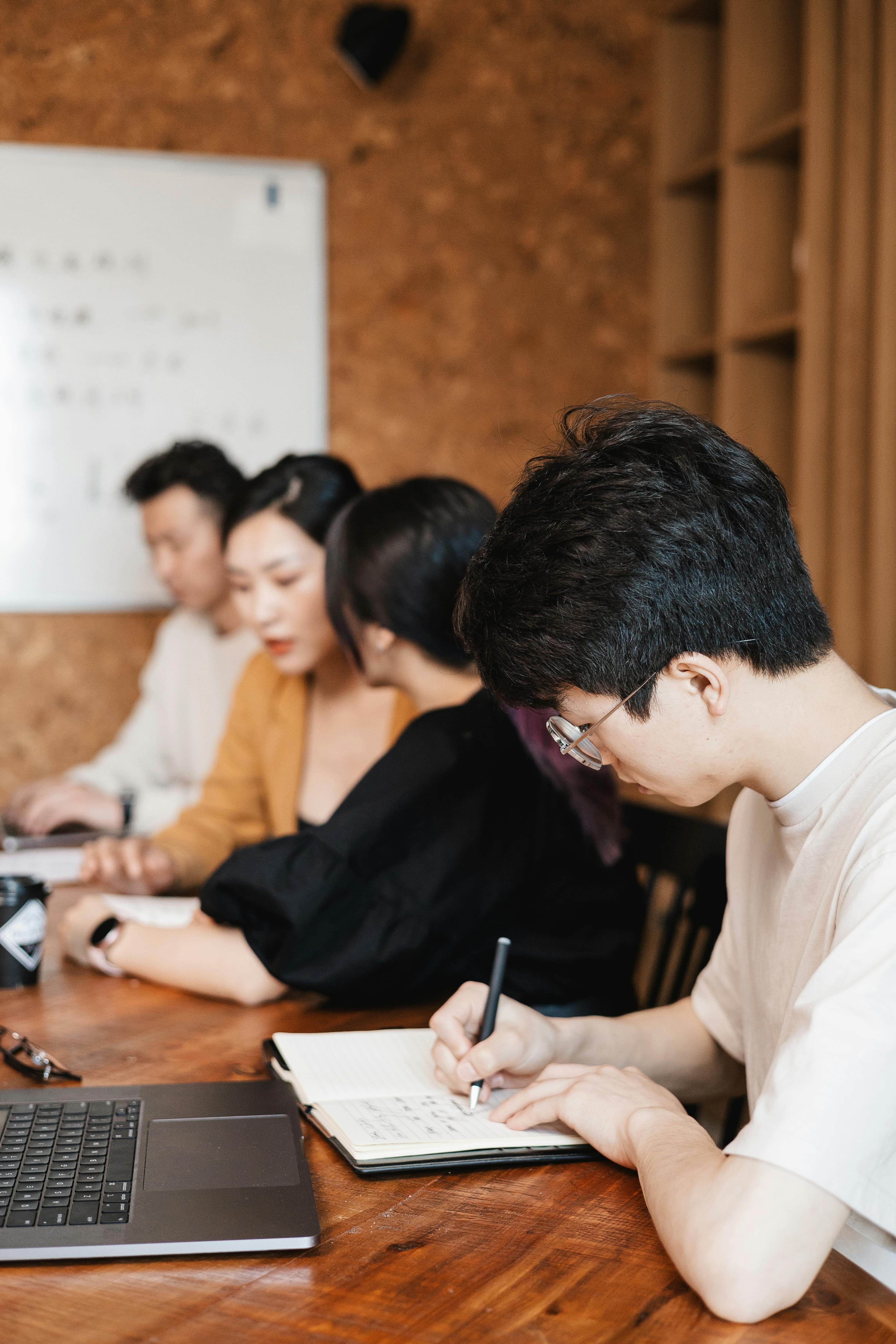 Workers collaborating on a Taskmono engagement